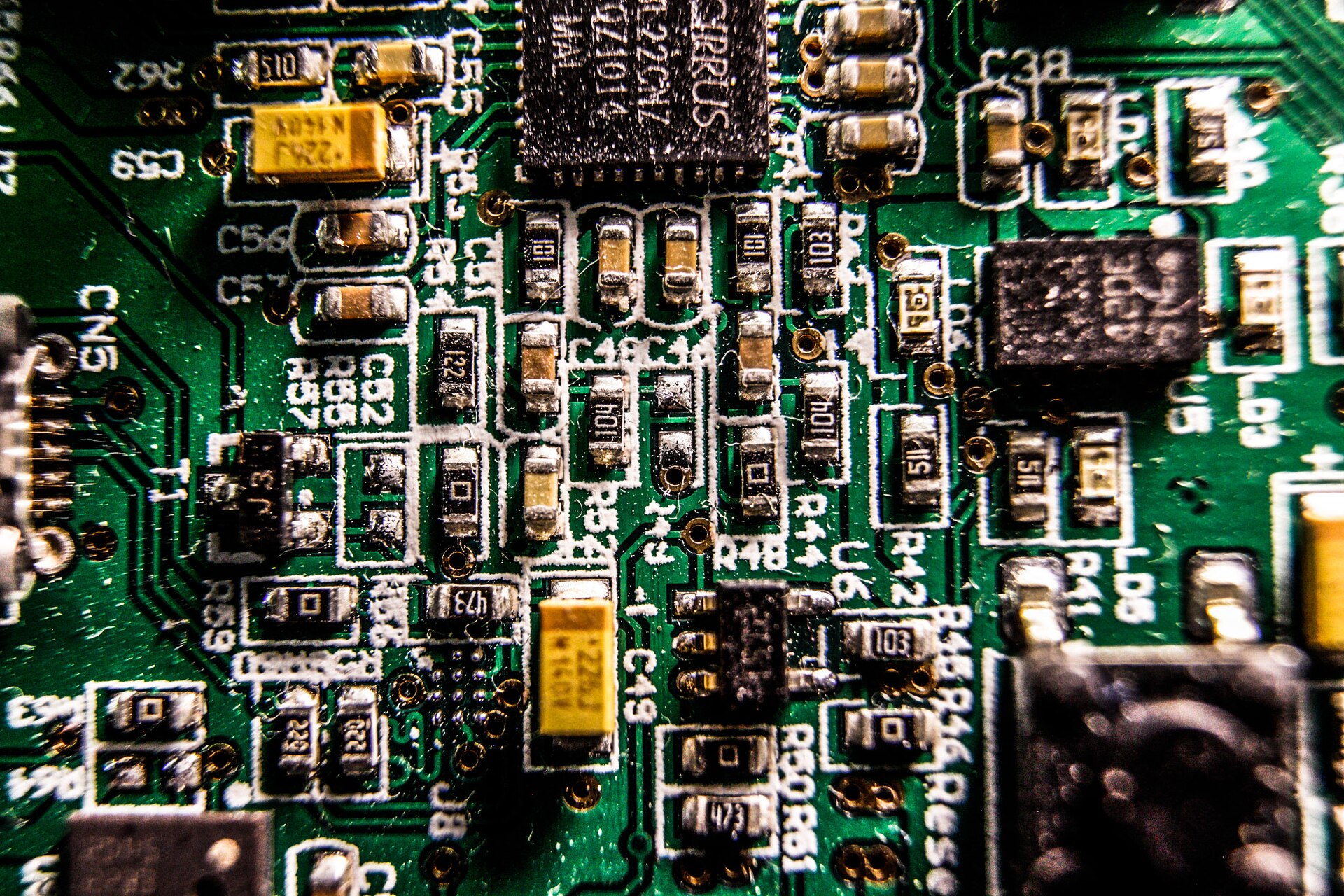 Macro photograph of a green printed circuit board